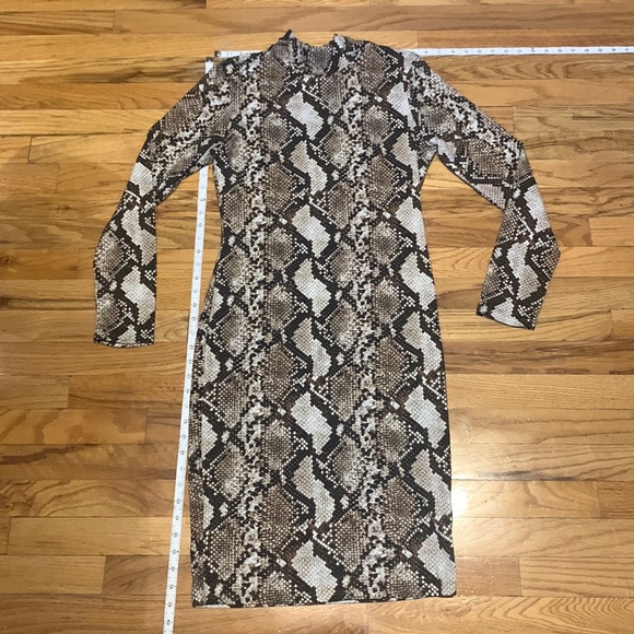 Long- sleeved, mock turtle neck, snakeskin print, mid length fitted dress